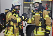 firefighters shaking hands