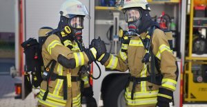 firefighters shaking hands