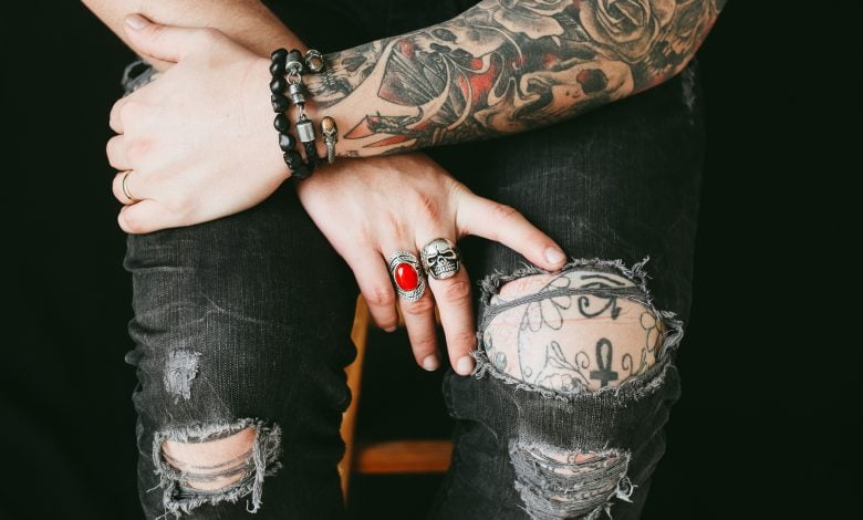 Can a firefighter have hand tattoos
